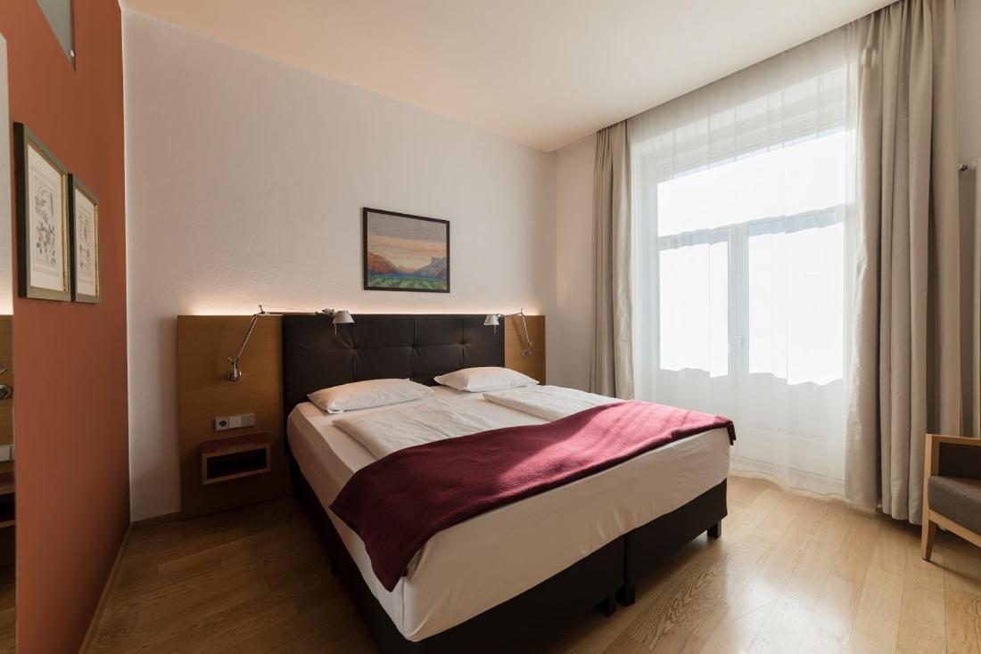 Hotel Stiegl Scala Больцано Номер фото