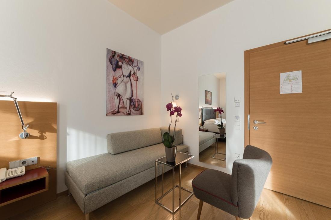 Hotel Stiegl Scala Больцано Номер фото