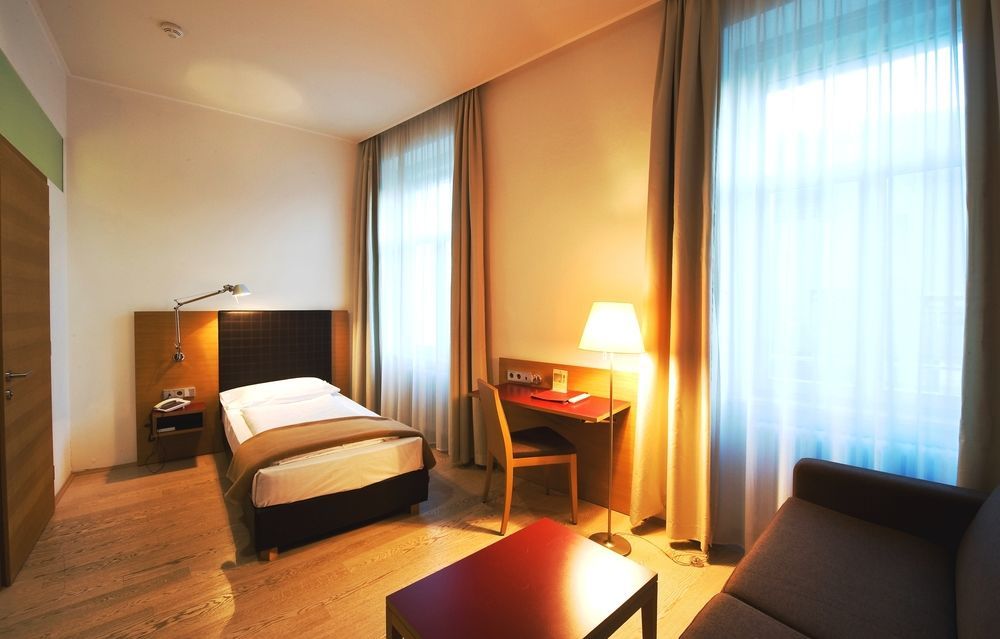 Hotel Stiegl Scala Больцано Номер фото